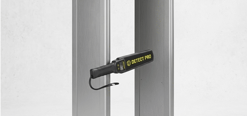 Sleek commercial walkthrough metal detector integrated into a modern corporate building lobby for advanced access control.